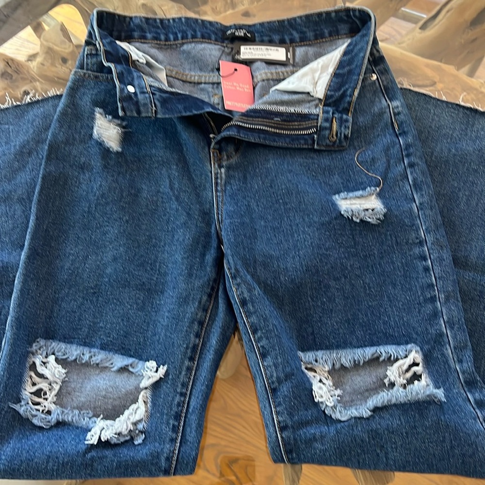 Pretty Little Thing (Petite) blue jeans.